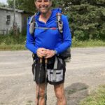 hiker standing with poles