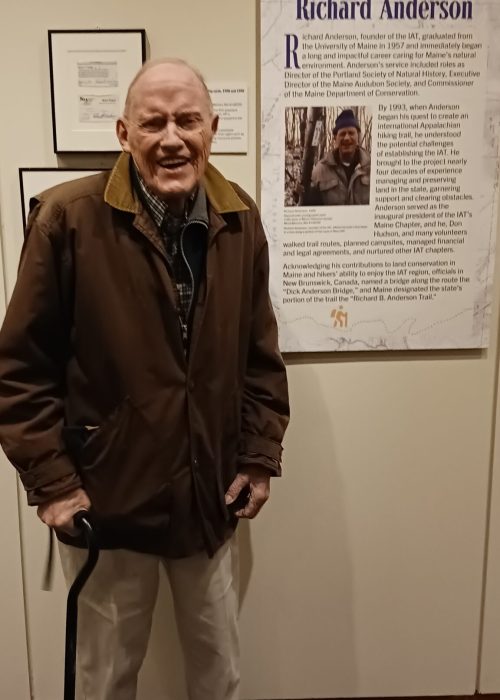 Richard Anderson standing in front of his exhibit