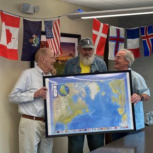 Dick Anderson and Don Hudson presenting Will French with a Poster